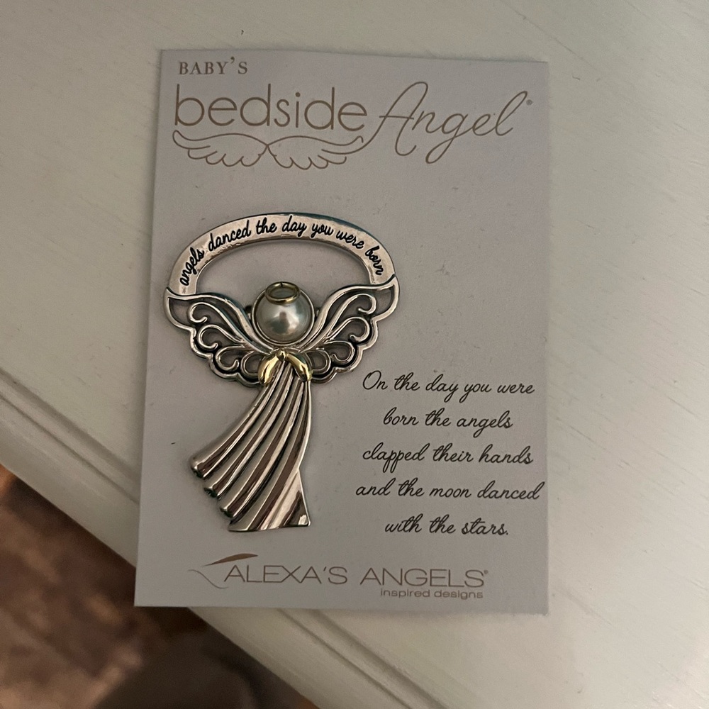 Baby’s bedside angel